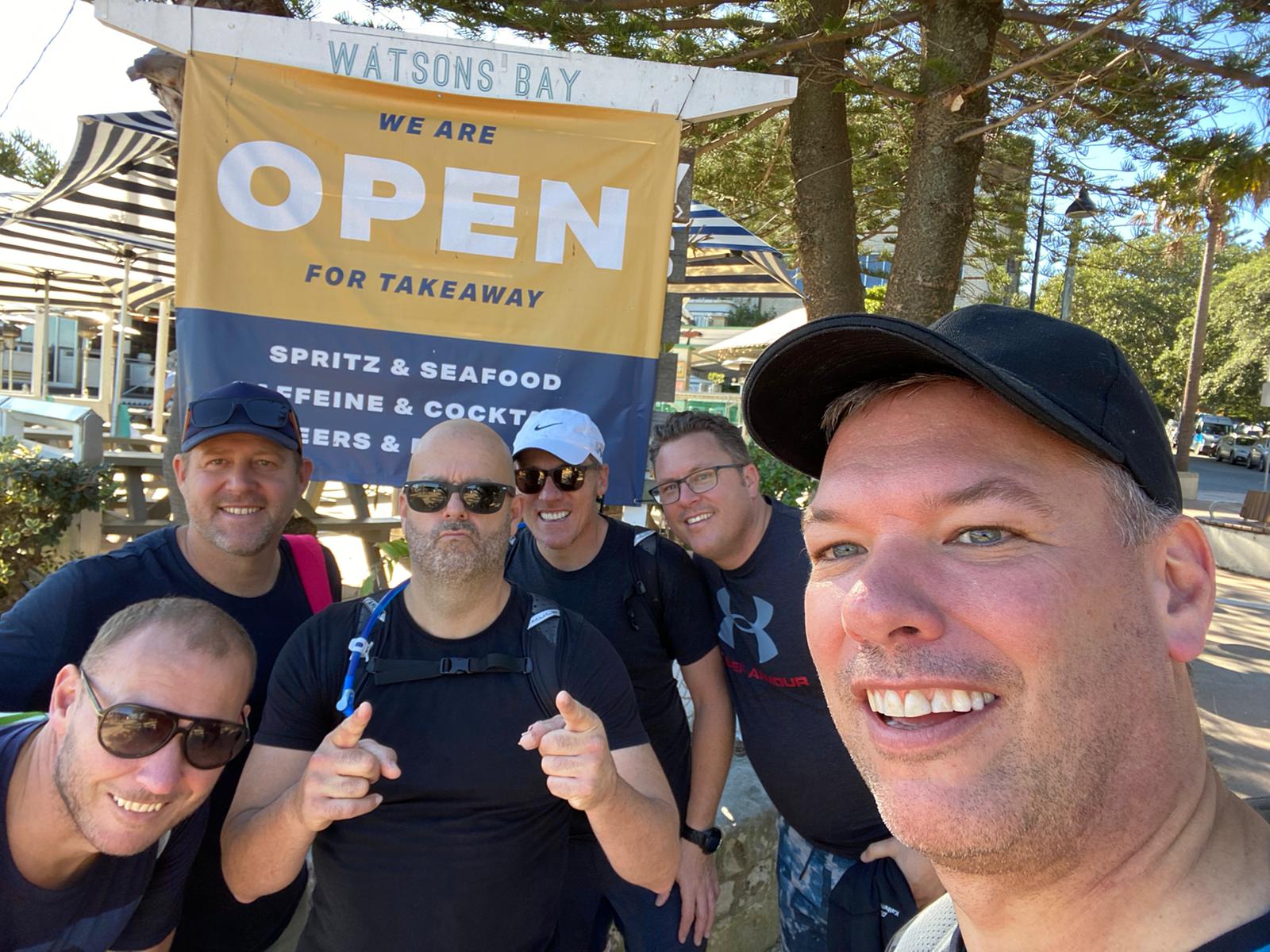Six blokes at Watsons Bay at the finish