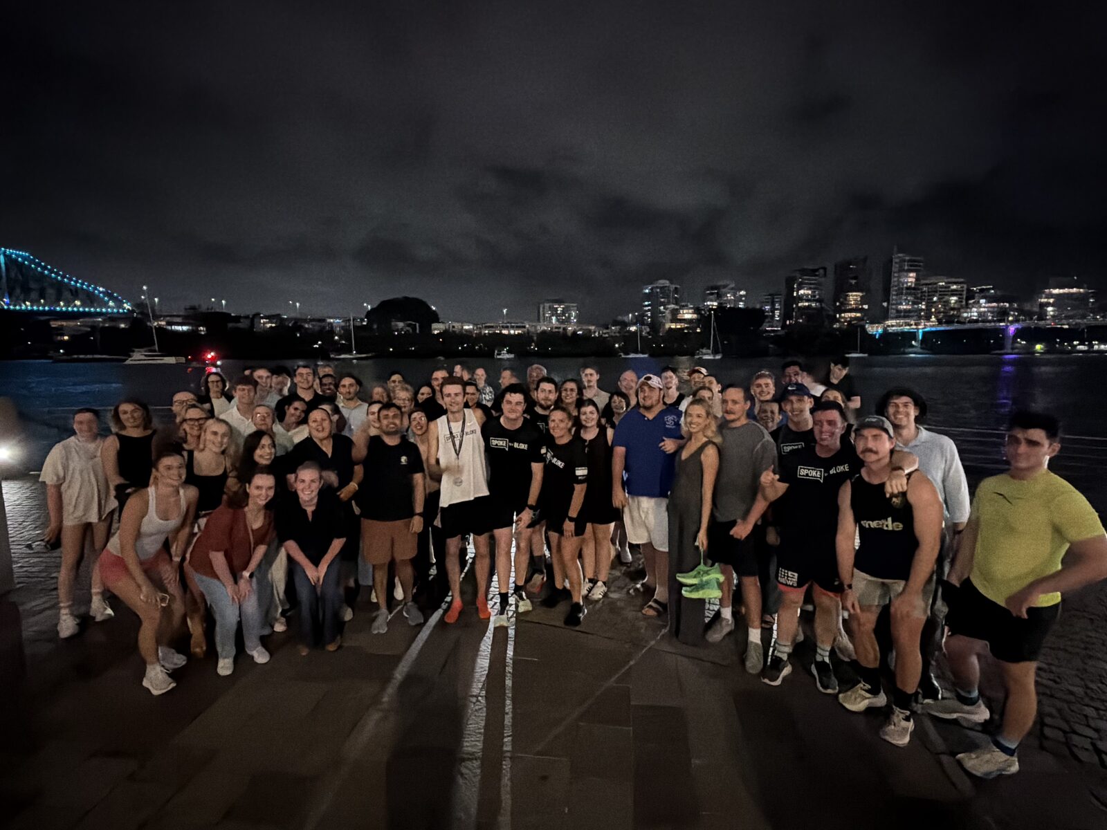 The full crowd of supporters gathered at night to finish Ben's seventh marathon